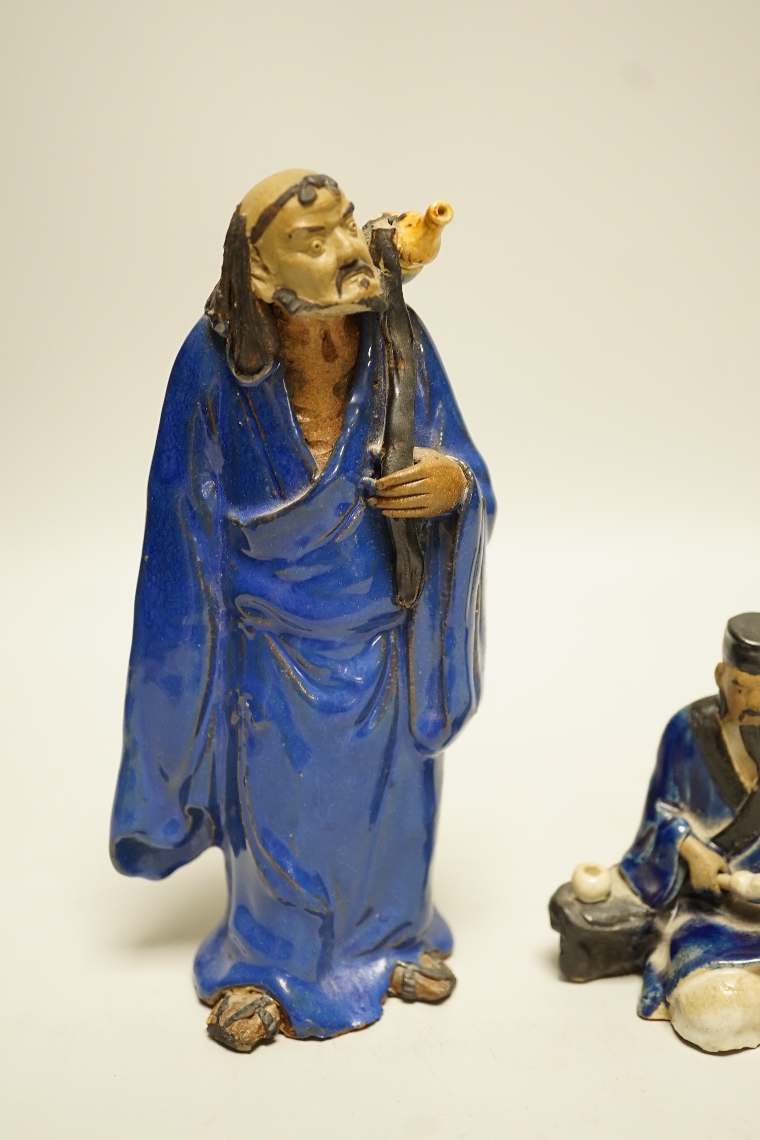 Two Chinese glazed pottery figures of Li Tieguai and Lu Dongbin, late 19th/early 20th century, largest 18cm